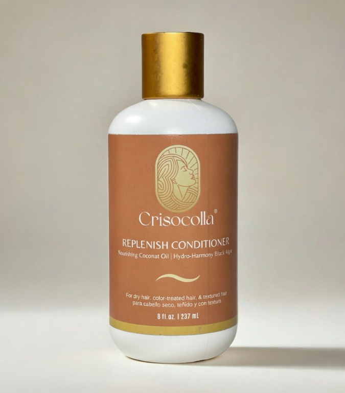 Crisocolla BotaniReset Plant based Replenish Conditioner bottle with gold cap on a light background. For dry hair, curly wavy, color treated and coily hair.