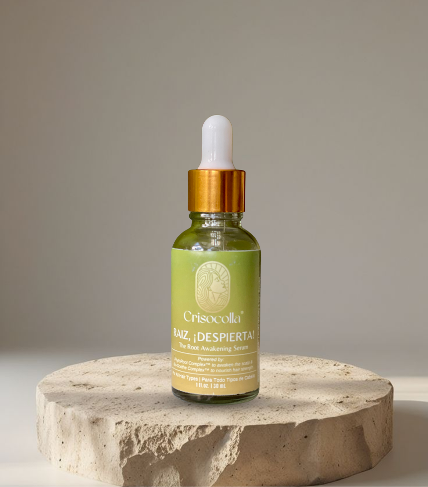 Crisocolla's Raiz Despierta, root awakening serum bottle, dropper bottle on a stone surface with a neutral background. made in Puerto Rico.