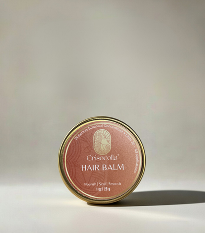 Crisocola lightweight, plant based hair balm container on a light background.