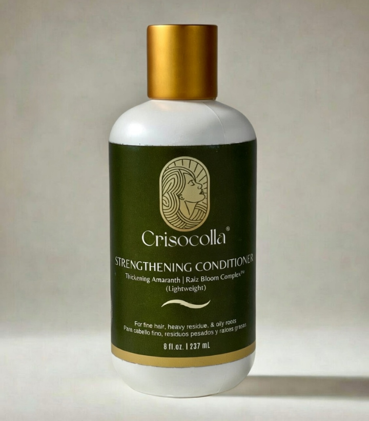 Crisocolla plant based Strengthening Conditioner bottle with gold cap on a light background